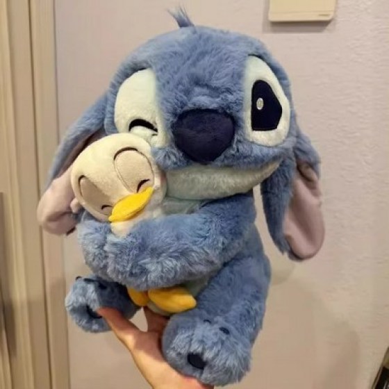 Stitch - plišana igračka s pačićem